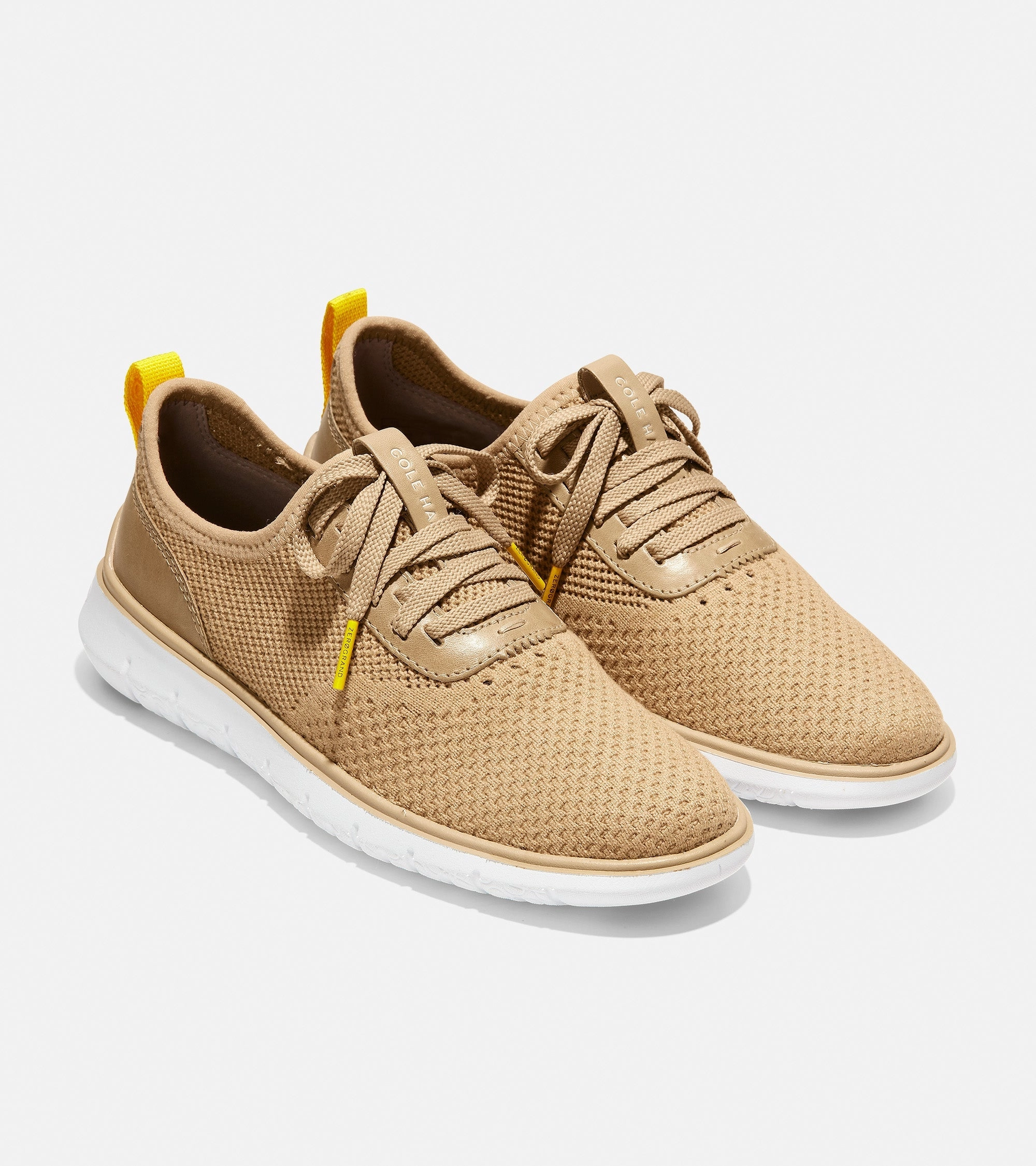 Generation ZER?GRAND sports essentials running in a coral reef area shoes