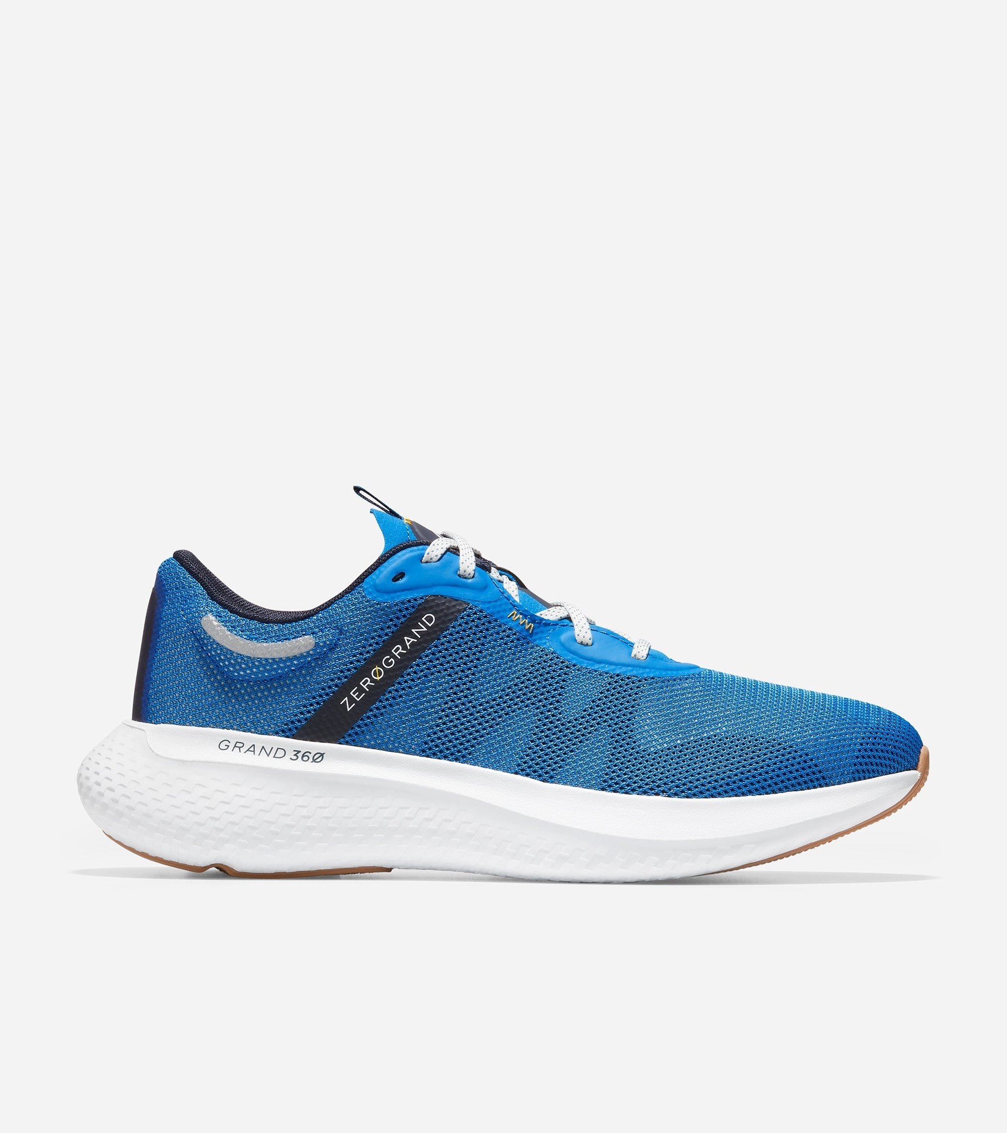 ZER?GRAND Outpace 2 Running Shoe running on soft surface